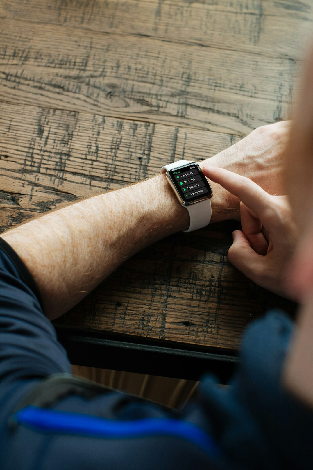 senior using fitness tracker