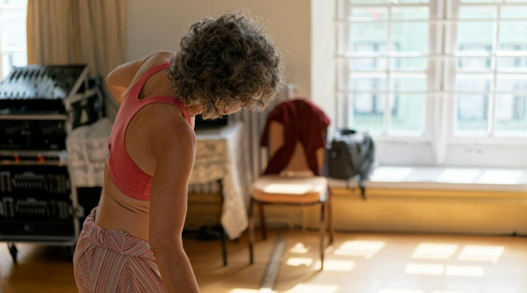 elderly woman doing yoga