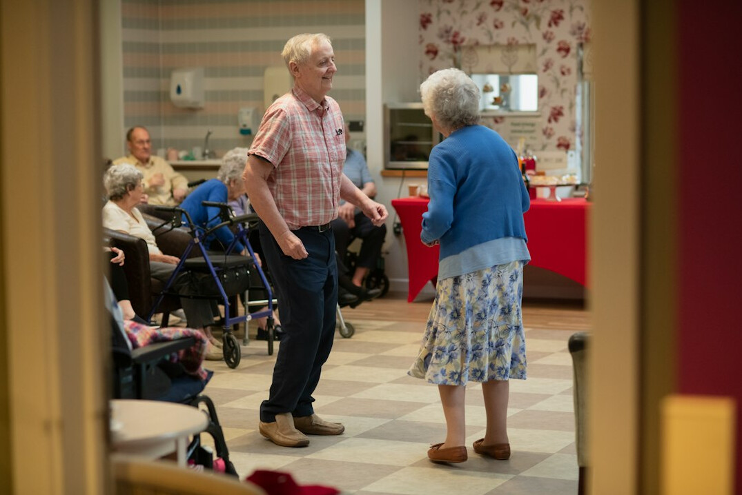 elderly group dancing